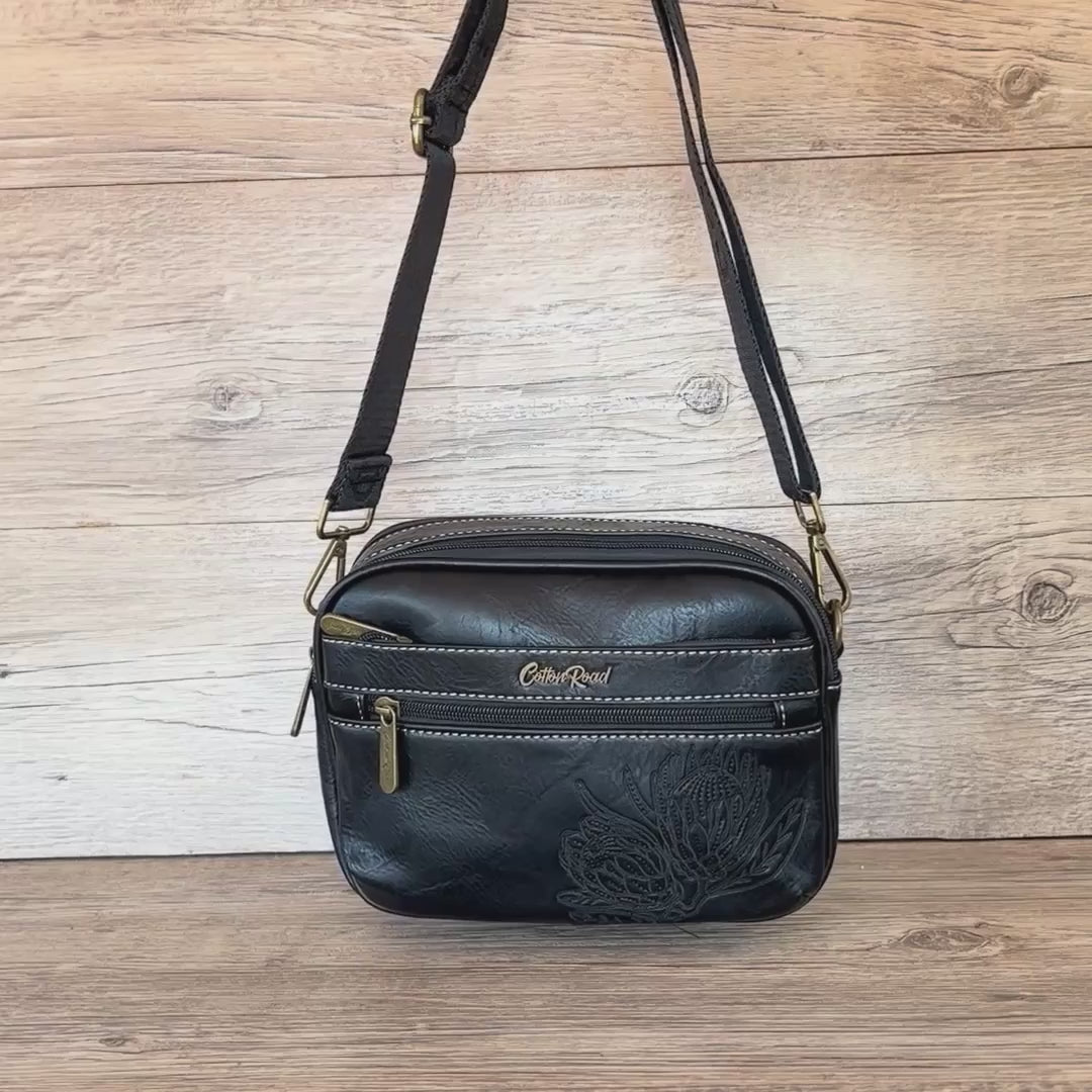 Cotton Road Sling Bag: BLACK Protea PU Leather Crossbody Bag with Branded STRAP HANGING VIDEO