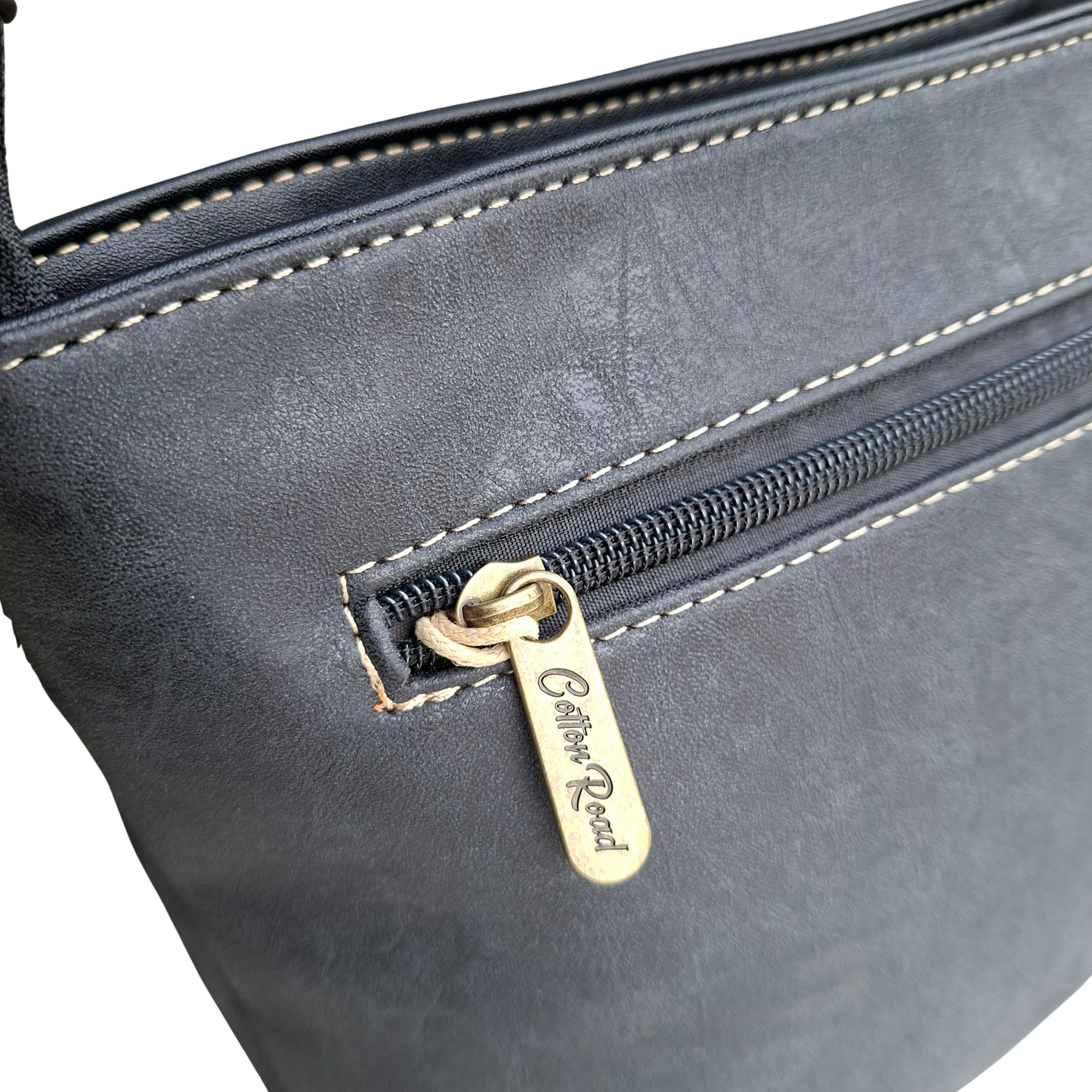 Cotton Road Sling Bag: BLACK PU Leather with Embossed Protea