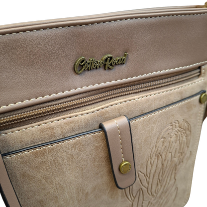 Cotton Road Sling Bag: KHAKI PU Leather with Embossed Protea