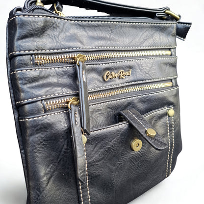 Cotton Road Sling Bag: BLACK PU Leather with Metal Zips