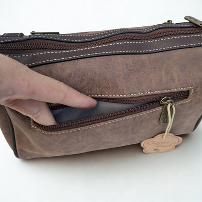Cotton Road Sling Bag: COFFEE BROWN PU Leather Sling Bag with Protea detail