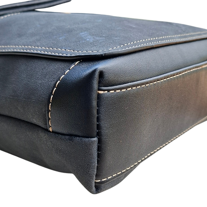 Cotton Road Sling Bag: BLACK PU Leather with Embossed Protea