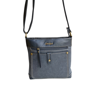Cotton Road Sling Bag: BLACK PU Leather with Embossed Protea