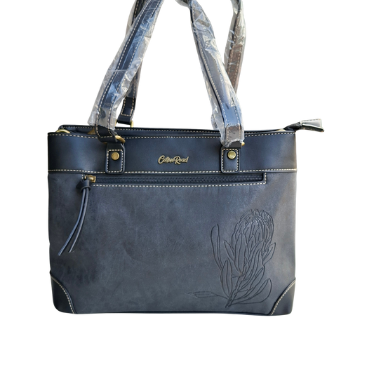 Cotton Road Handbag: BLACK PU Leather Double Compartment Handbag with EMBOSSED Protea