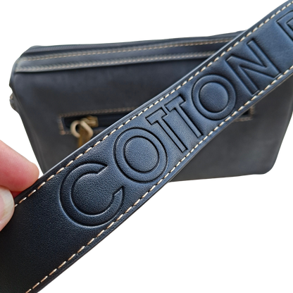 Cotton Road Sling Bag: BLACK PU Leather with Embossed PROTEA and BRANDED Strap
