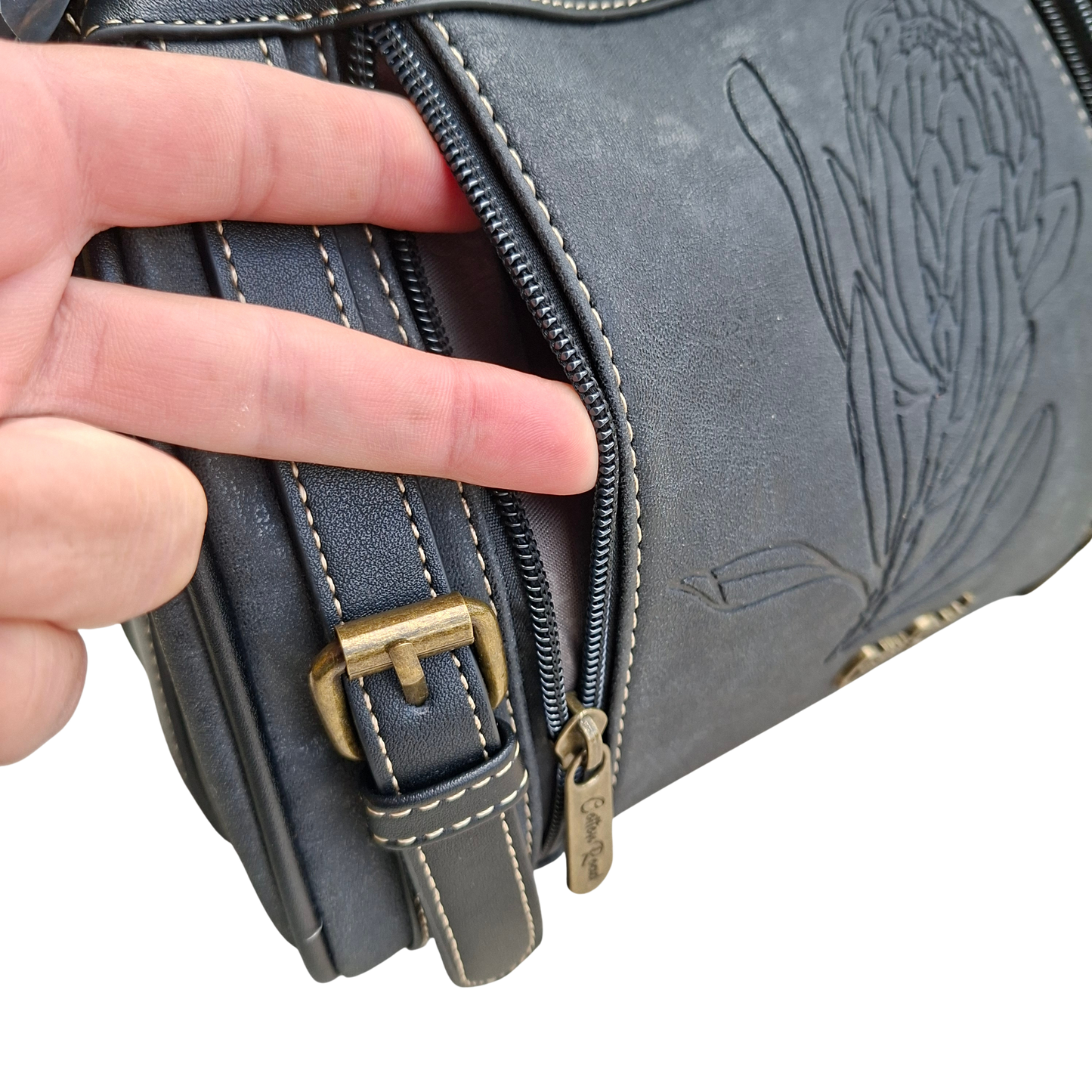 Cotton Road Sling Bag: BLACK PU Leather with Embossed PROTEA and BRANDED Strap