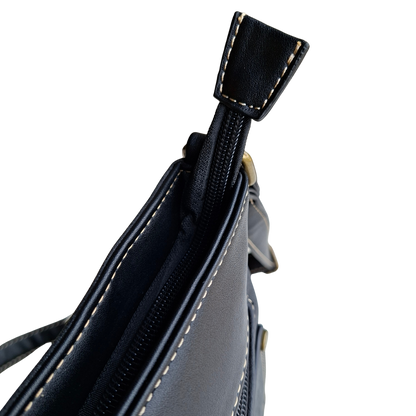 Cotton Road Sling Bag: BLACK PU Leather with Embossed Protea