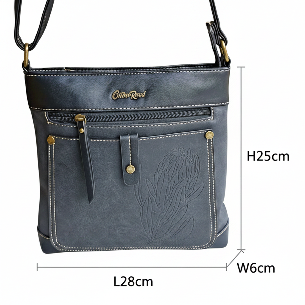 Cotton Road Sling Bag: BLACK PU Leather with Embossed Protea