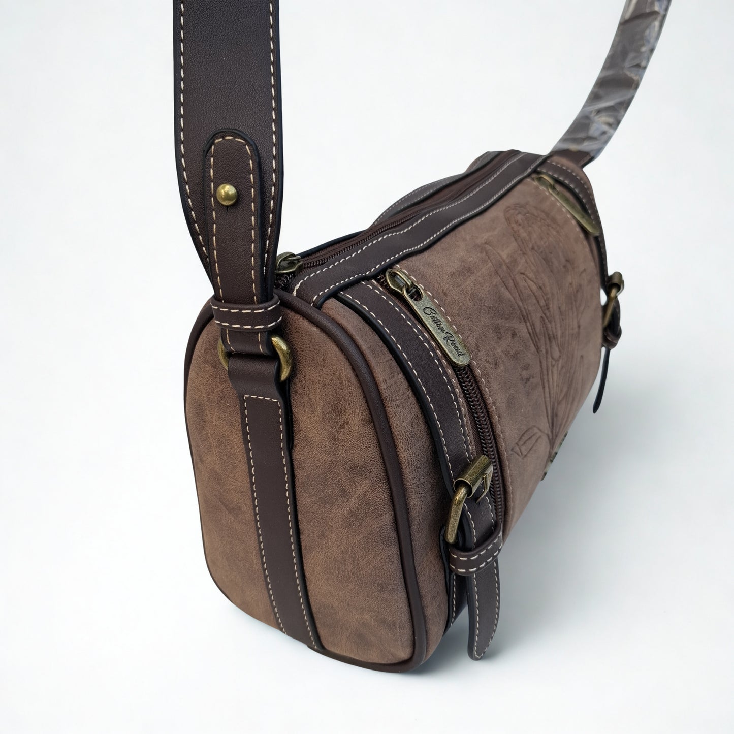 Cotton Road Sling Bag: COFFEE BROWN PU Leather Sling Bag with Protea detail