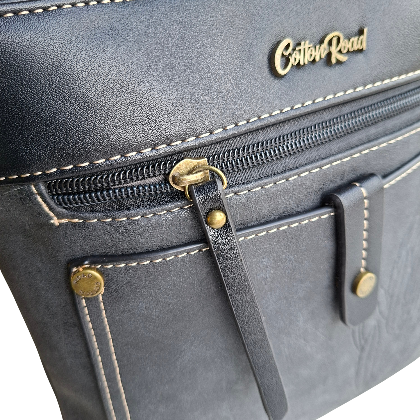 Cotton Road Sling Bag: BLACK PU Leather with Embossed Protea