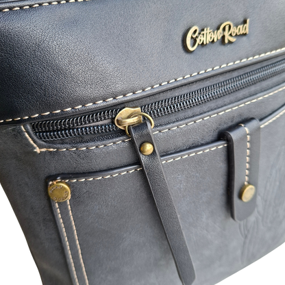 Cotton Road Sling Bag: BLACK PU Leather with Embossed Protea