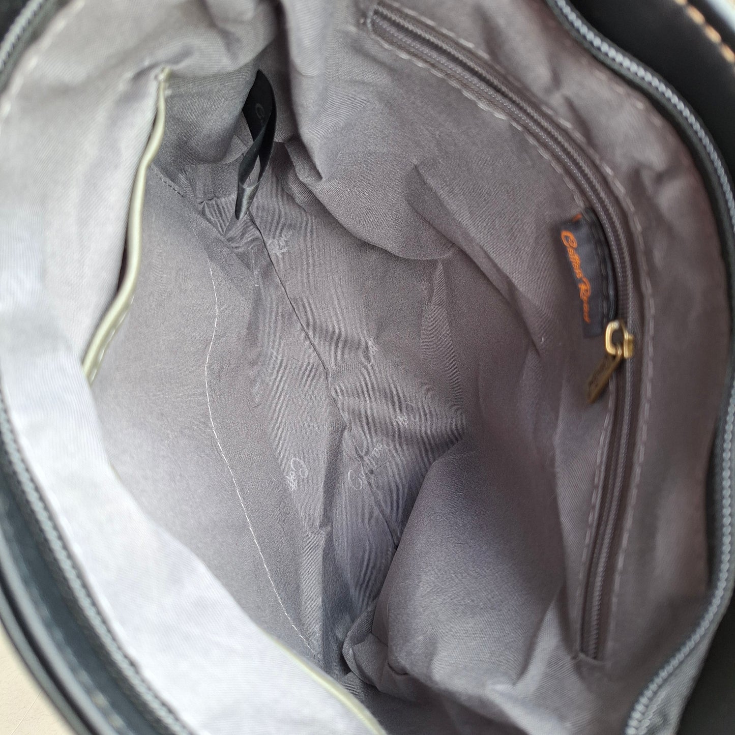 Cotton Road Sling Bag: BLACK PU Leather with Embossed Protea
