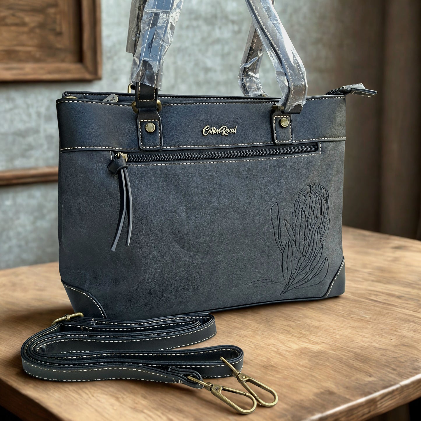 Cotton Road Handbag: BLACK PU Leather Double Compartment Handbag with EMBOSSED Protea