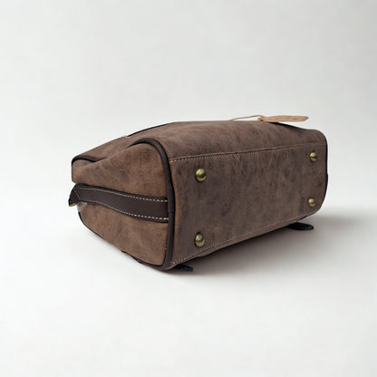 Cotton Road Sling Bag: COFFEE BROWN PU Leather Sling Bag with Protea detail