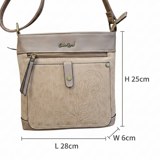Cotton Road Sling Bag: KHAKI PU Leather with Embossed Protea