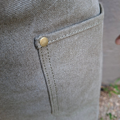 A heavy-duty vivace waxed cotton apron pocket