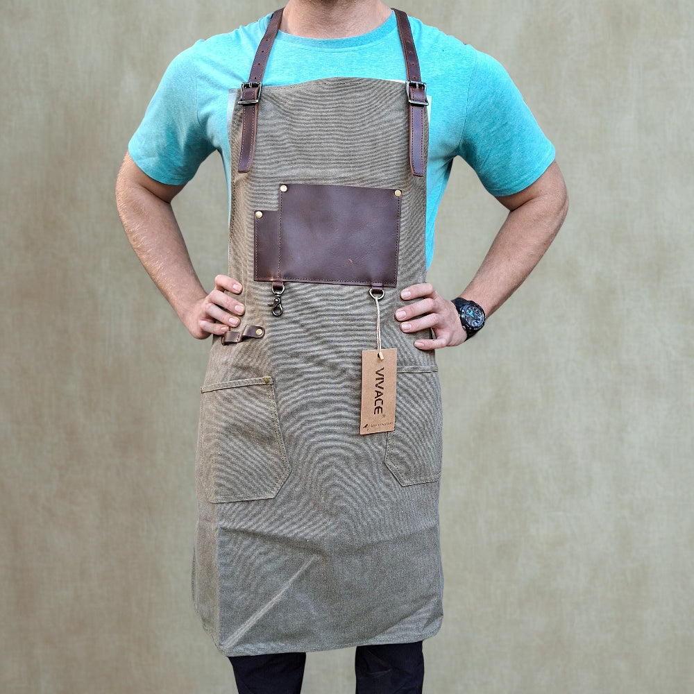 A heavy-duty vivace waxed cotton apron worn by model