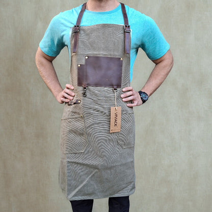 A heavy-duty vivace waxed cotton apron worn by model