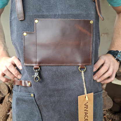 vivace Waxed cotton apron front leather pocket detail