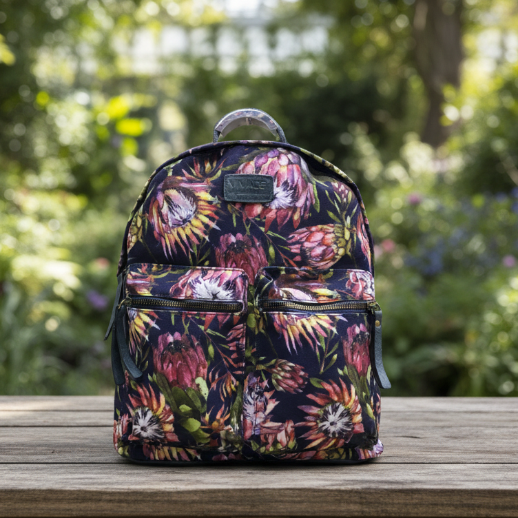 Vivace Backpack: Medium BLACK Canvas Backpack with Protea Detailing