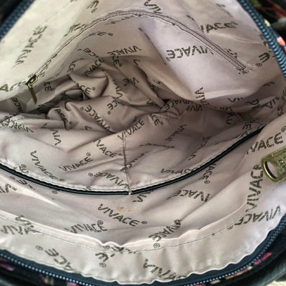Close-up of a bag with 'Vivace' branding on the interior lining.
