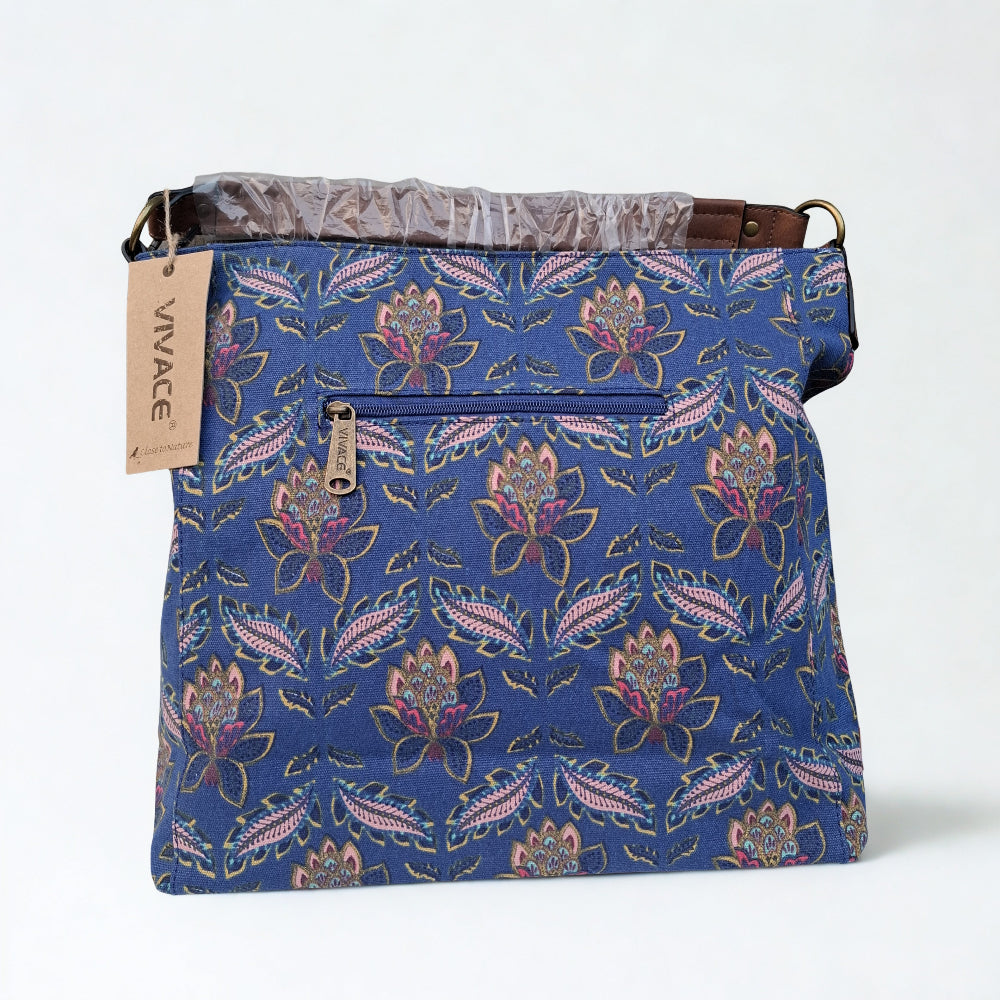 VIVACE Handbag: BLUE Canvas Handbag with MULTICOLOUR FLOWERS and BROWN PU Leather Trim