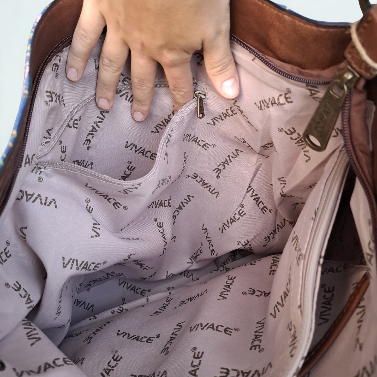 VIVACE Handbag: BLUE Canvas Handbag with MULTICOLOUR FLOWERS and BROWN PU Leather Trim