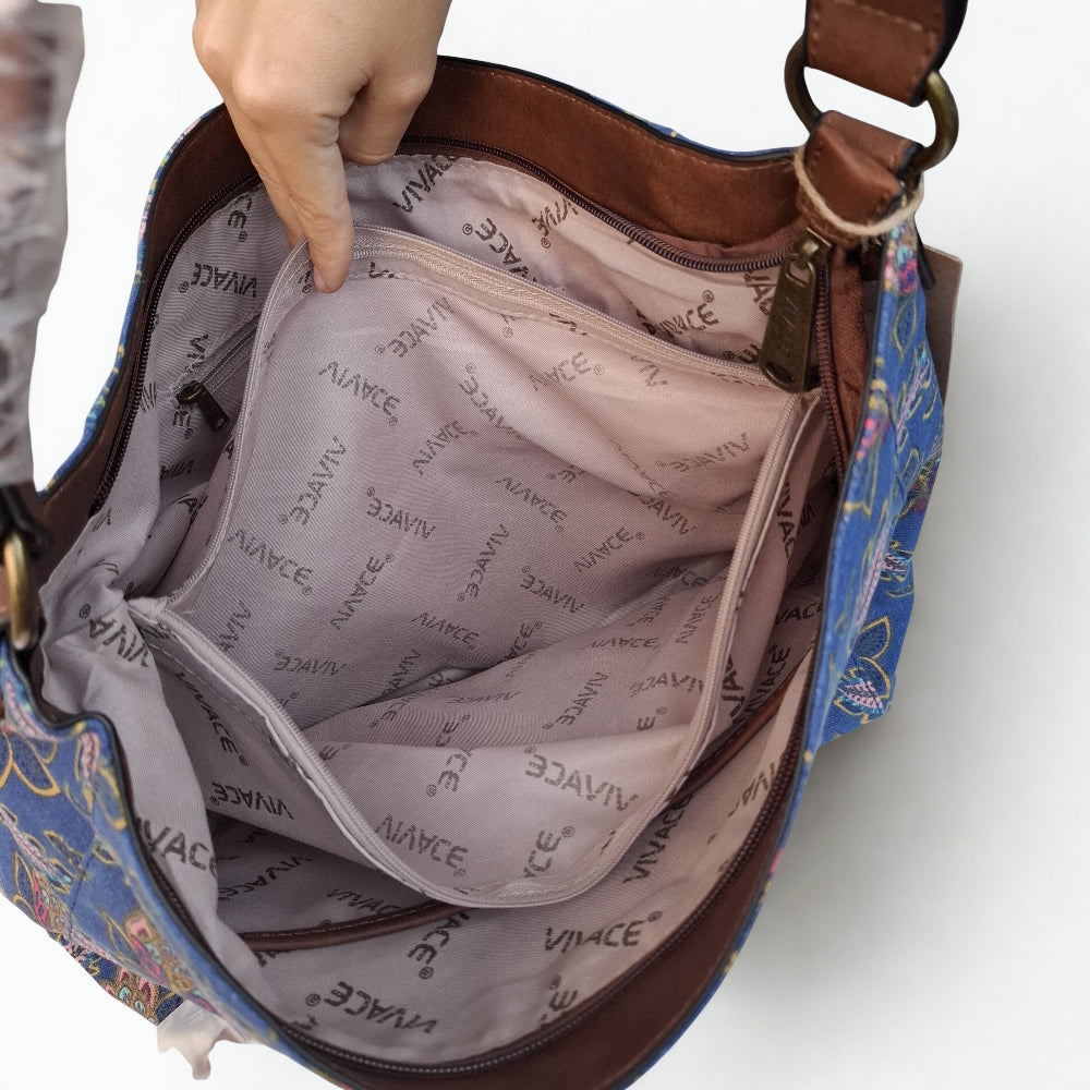 VIVACE Handbag: BLUE Canvas Handbag with MULTICOLOUR FLOWERS and BROWN PU Leather Trim
