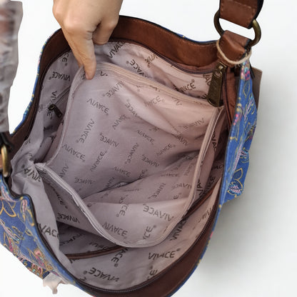 VIVACE Handbag: BLUE Canvas Handbag with MULTICOLOUR FLOWERS and BROWN PU Leather Trim