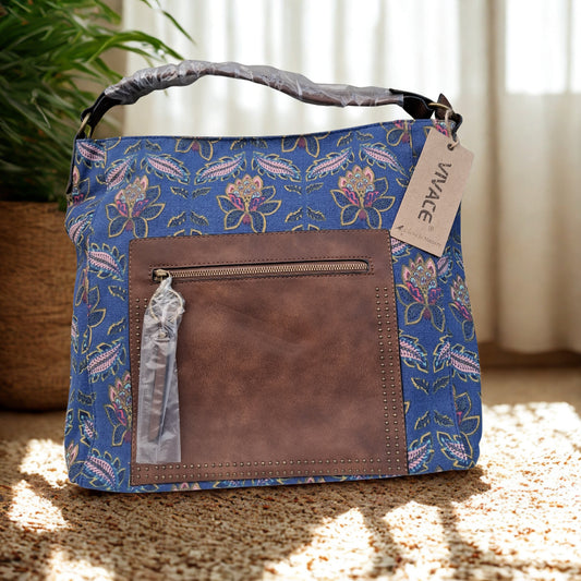 VIVACE Handbag: BLUE Canvas Handbag with MULTICOLOUR FLOWERS and BROWN PU Leather Trim