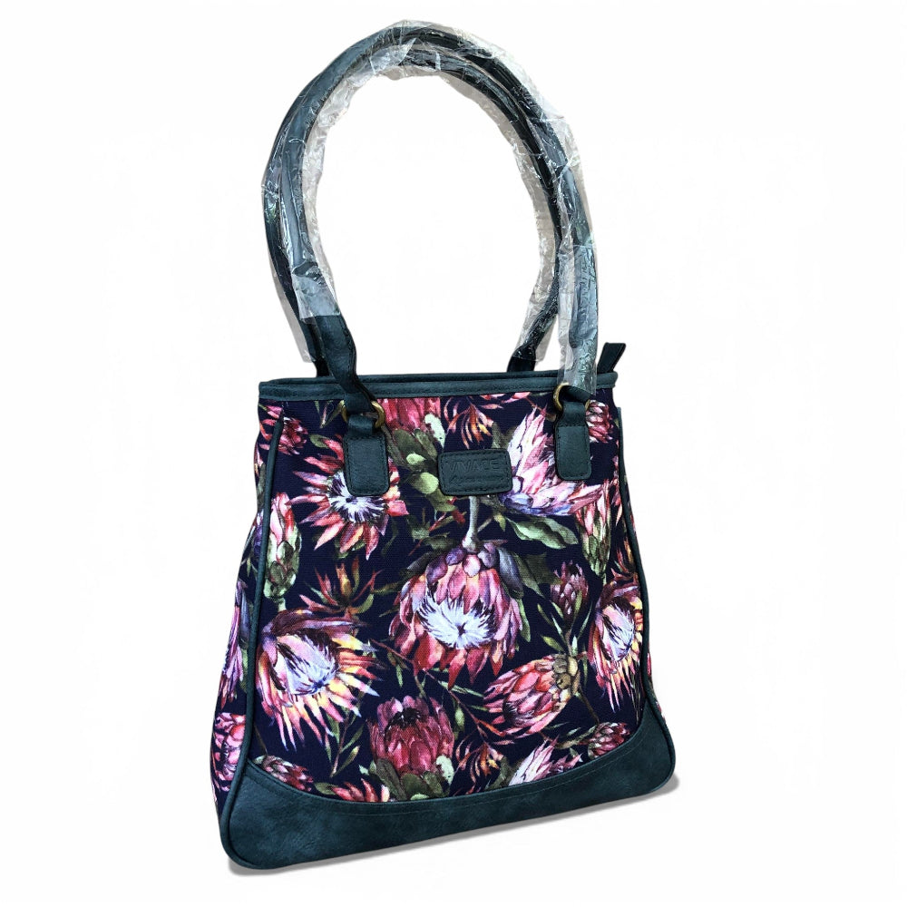 Vivace blue Protea canvas handbag front view on white