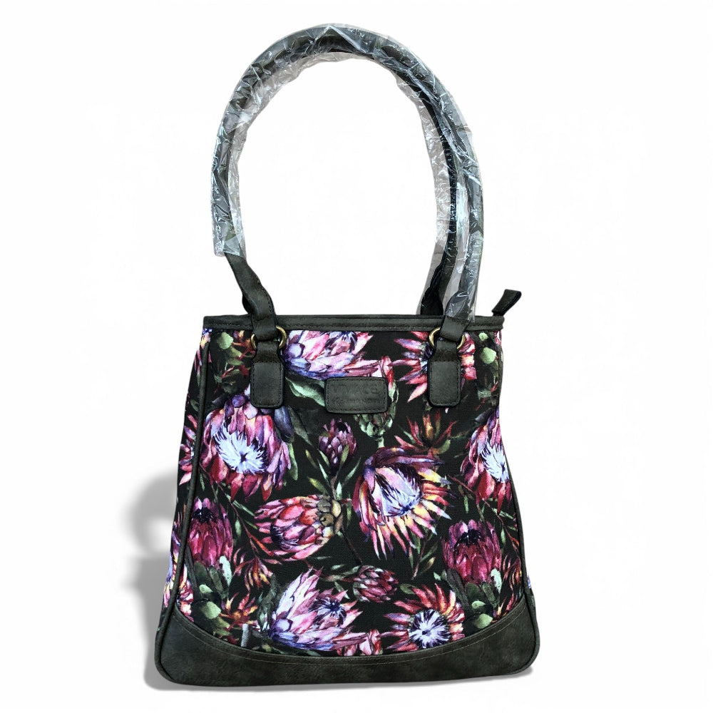 Vivace green Protea canvas handbag front view on white