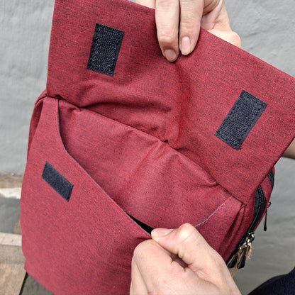 Red Vivace Laptop Backpack front pocket open view. 