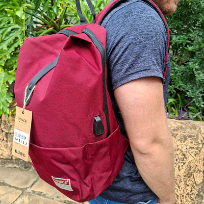 Vivace red canvas laptop backpack shoulder carry view. 