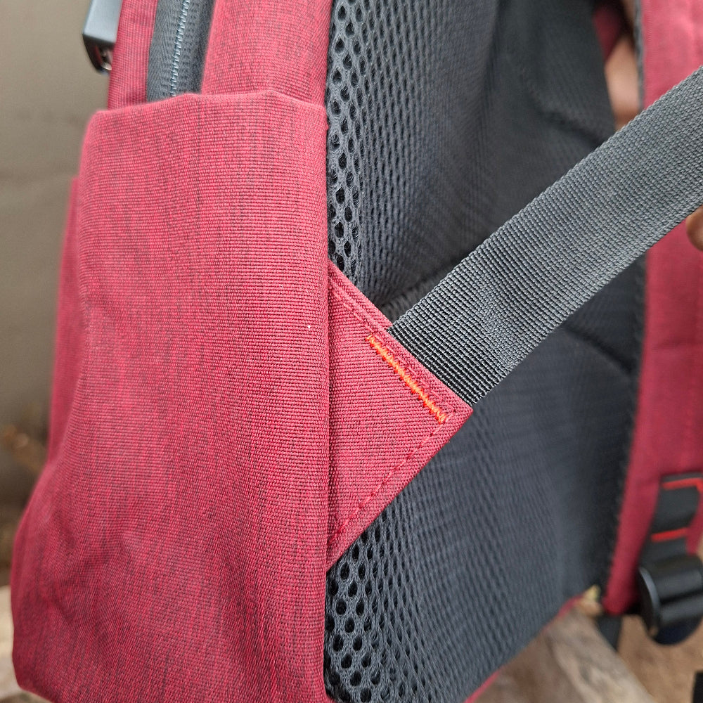 Red Vivace Laptop Backpack side view. 