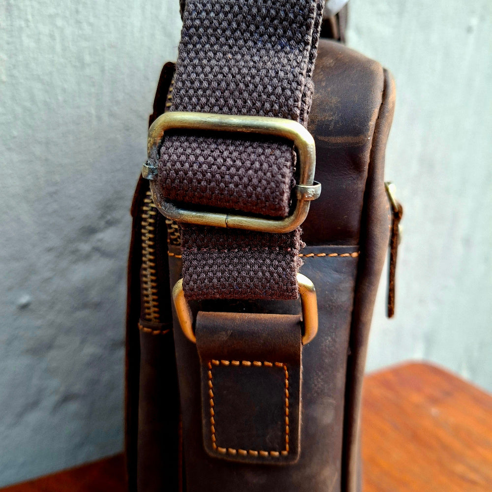 Vivace dark coffee sling bag strap attachment detail