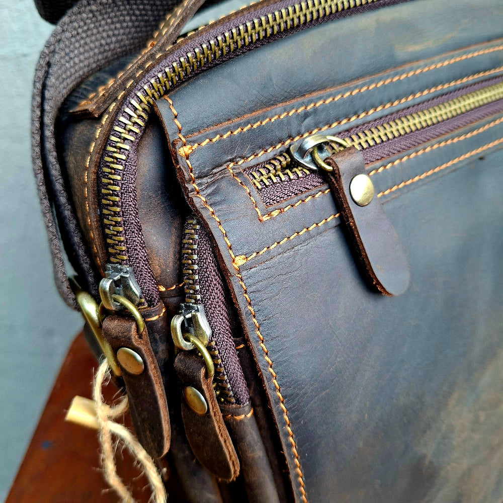 Vivace dark coffee sling bag strap zipper attachment detail