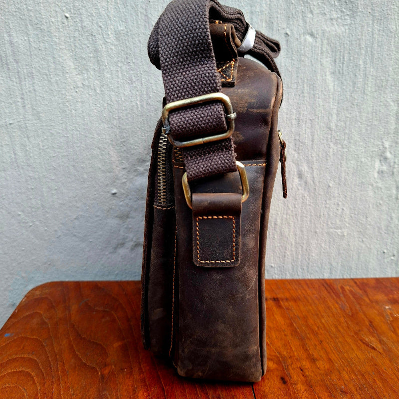 Vivace dark coffee sling bag strap attachment detail side view