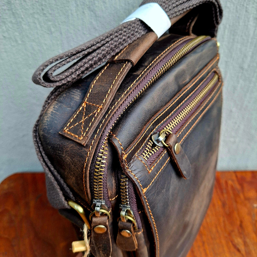 Vivace dark coffee sling bag strap attachment detail top view